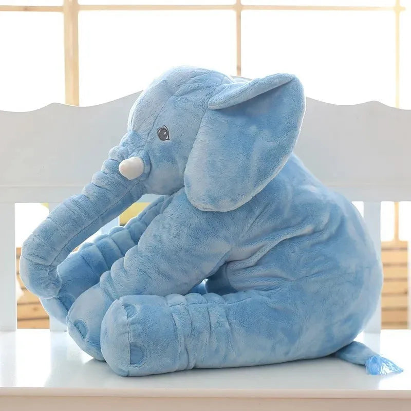 Soft grey elephant plush pillow case for baby sleeping companion on a bed