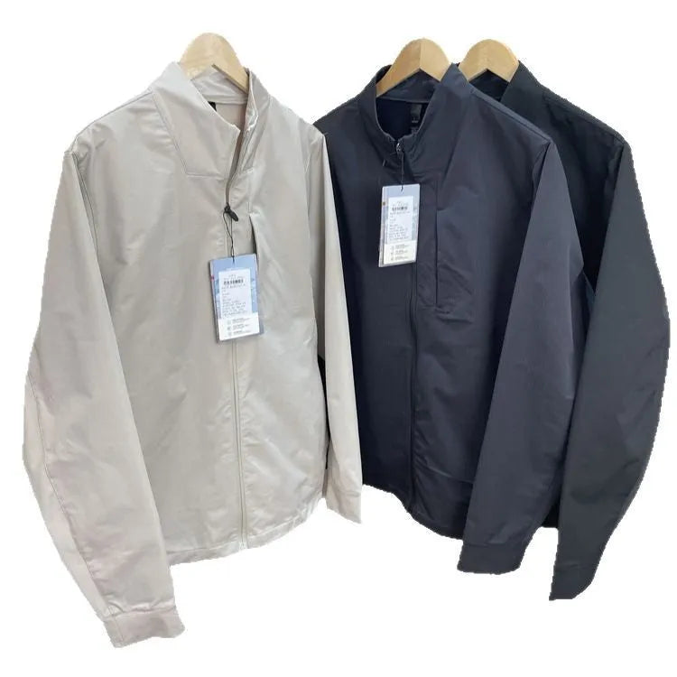 Men's black stand collar polyester sports casual jacket with long sleeves and straight hem