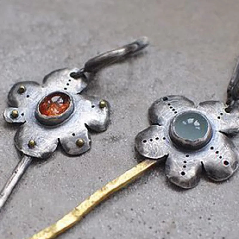 Geometric retro earrings with asymmetric two-tone colour and floral design