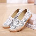 Women's flat heel ethnic cloth shoes in red, green, black, beige, or blue with colour stitching and a shallow mouth.
