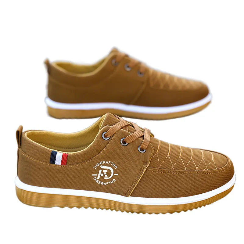 Men's black canvas casual shoes with a leather toe cap and platform sole.