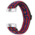 Printed elastic replacement watch strap compatible with Fitbit Charge 6, shown in an adjustable length.