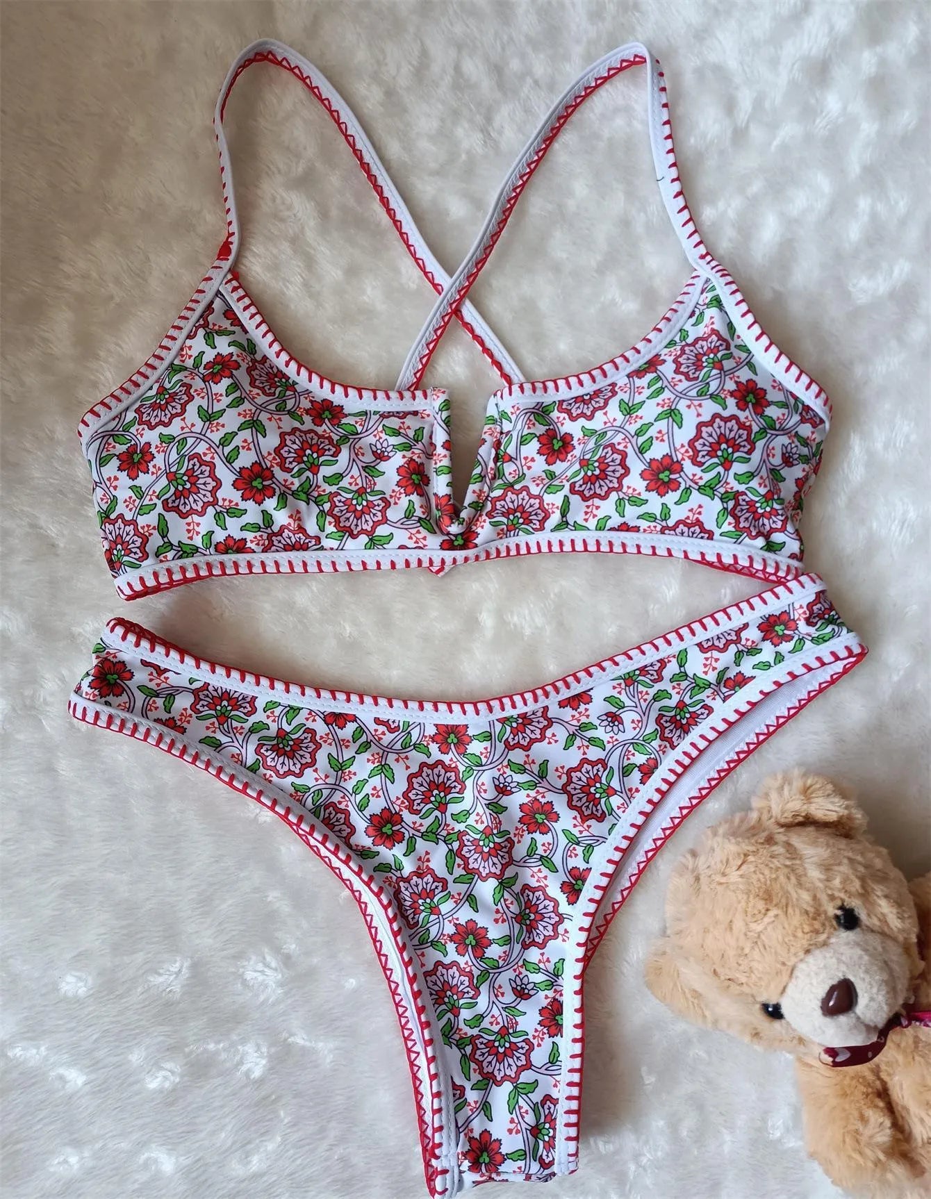 Women's floral print V-neck swimsuit with embroidery in blue and green colours