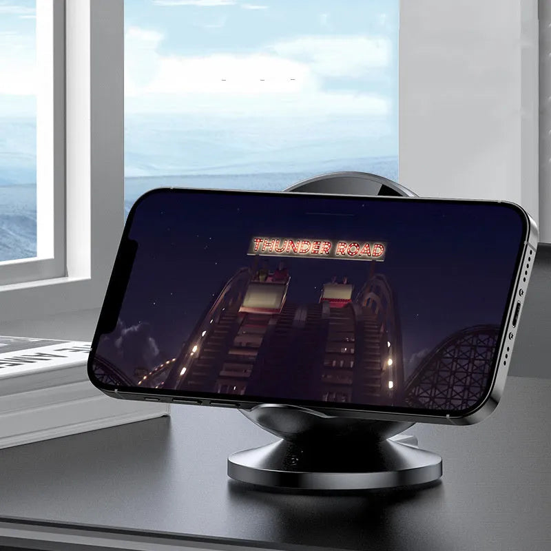 XC-11 mobile phone wireless charger holder with Bluetooth speaker in black colour on desk