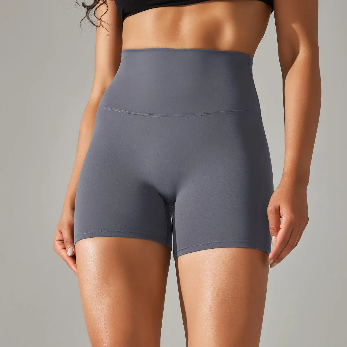 Women's high waist hip lift fitness tights in moisture-wicking fabric for gym and daily wear