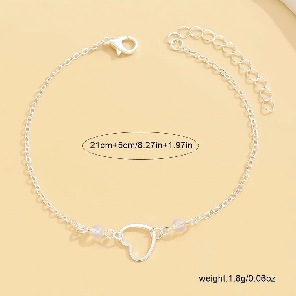 Adjustable gold or silver alloy anklet with heart-shaped pendant in simple geometric style
