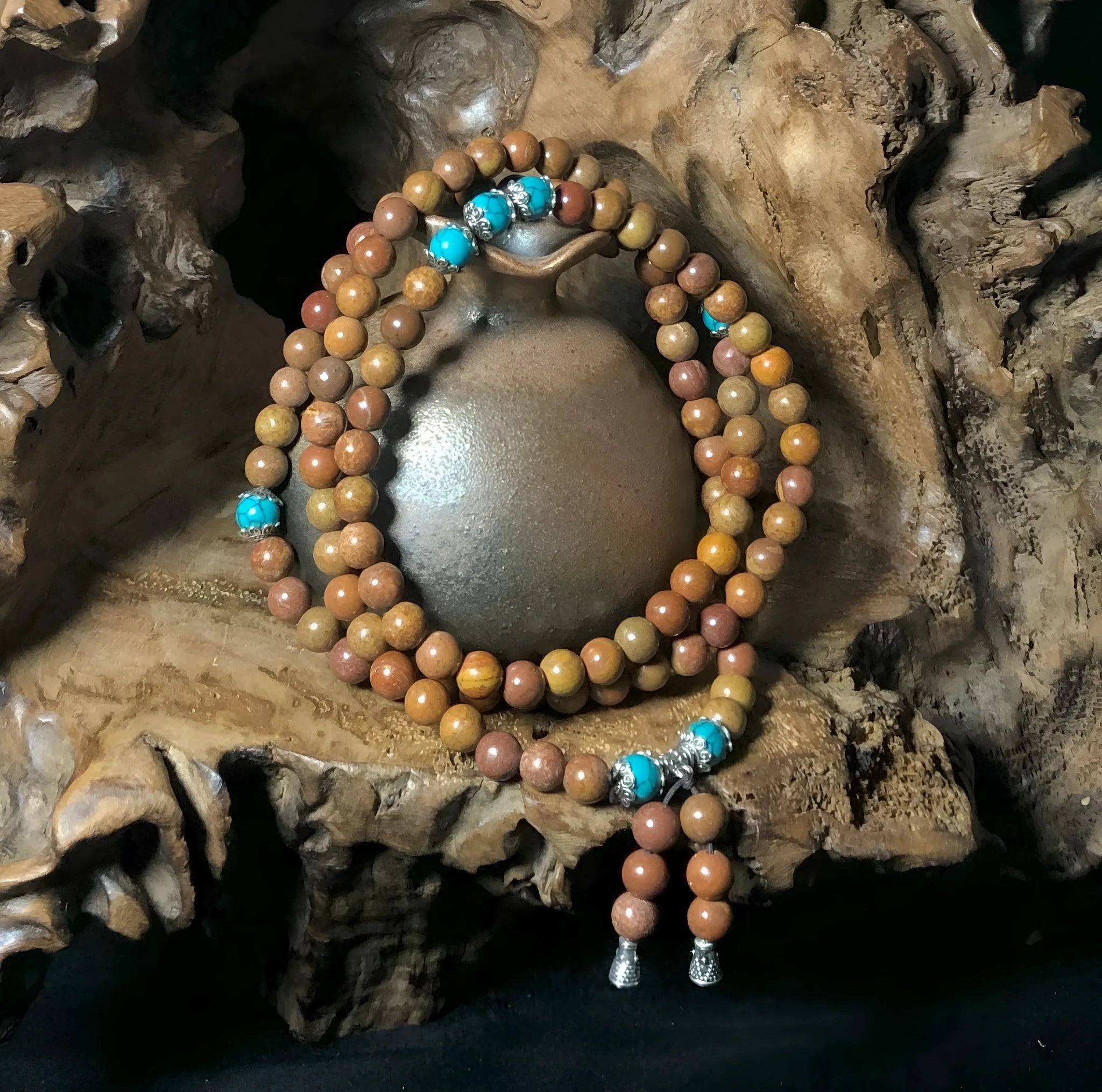 108 bead natural stone bracelet with hand-polished geometric lvzhu beads measuring 5-6mm diameter