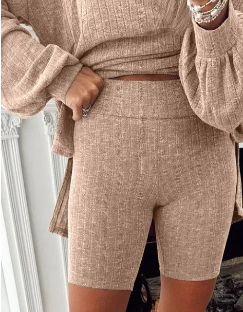 Dark khaki ribbed lantern sleeve sweater and motorcycle knit shorts set on woman