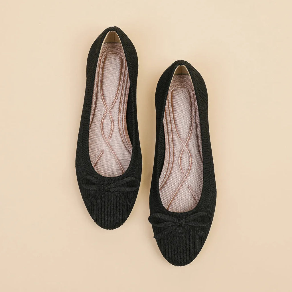Women's round toe fabric flat pumps with bow detail and oversleeve design in butterfly black colour