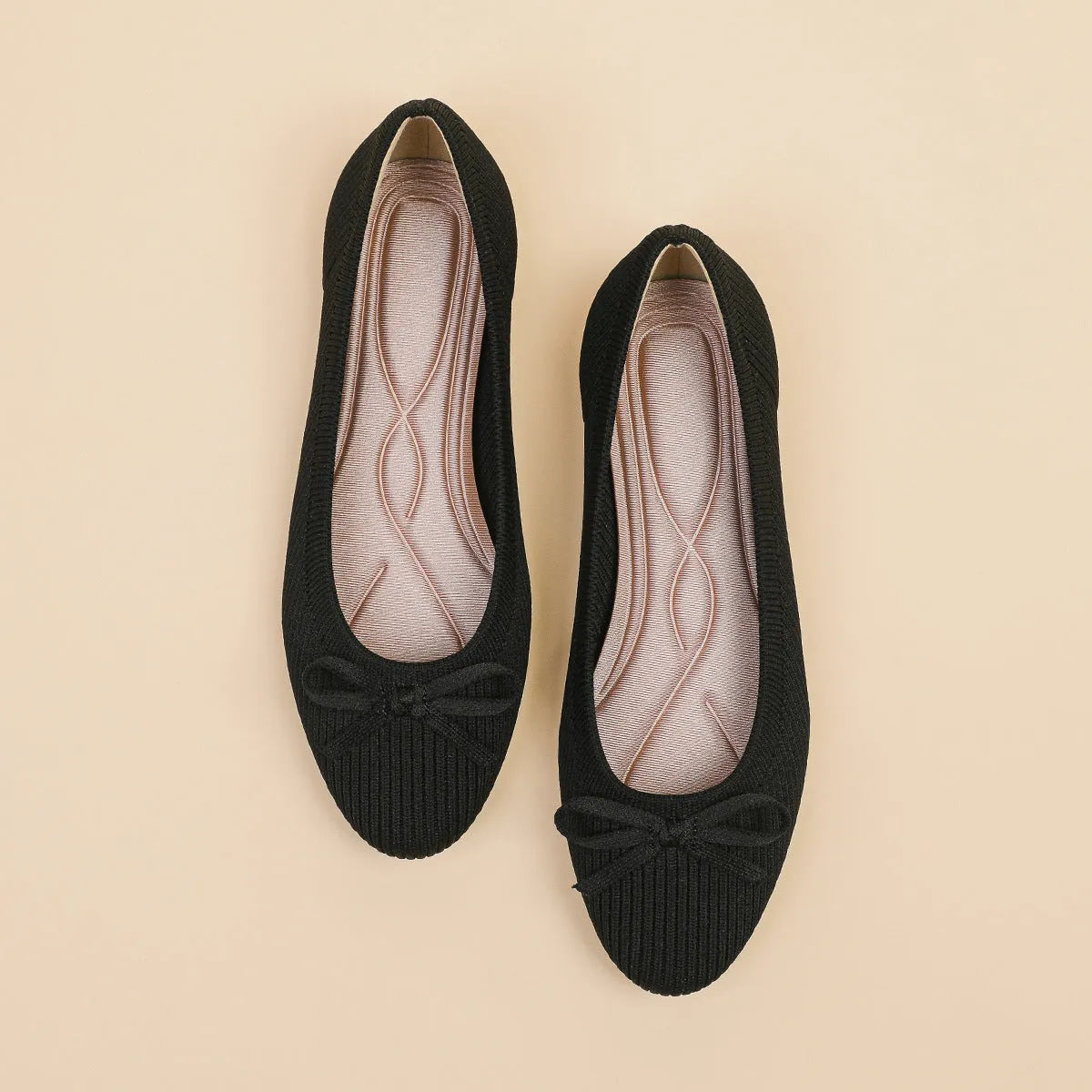 Women's round toe fabric flat pumps with bow detail and oversleeve design in butterfly black colour