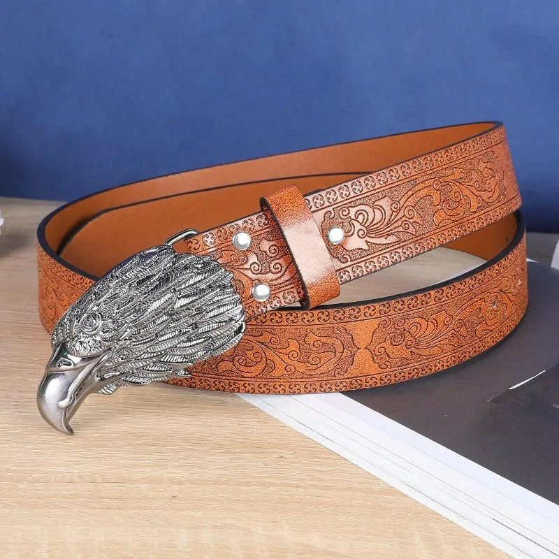 Men's belt with detailed cow head alloy buckle on imitation leather strap with pin buckle fastening