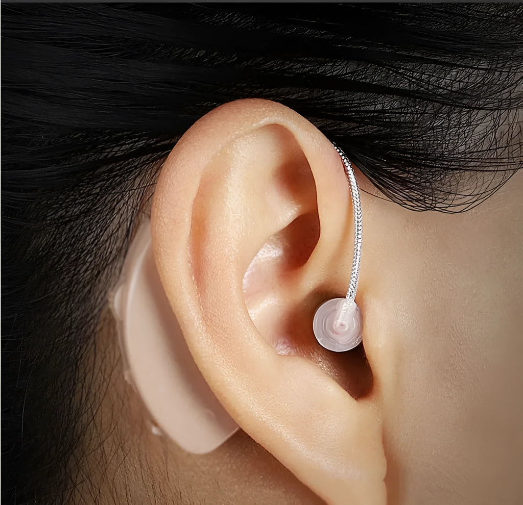 Black rechargeable hearing aid amplifier with silicone construction designed for elderly users