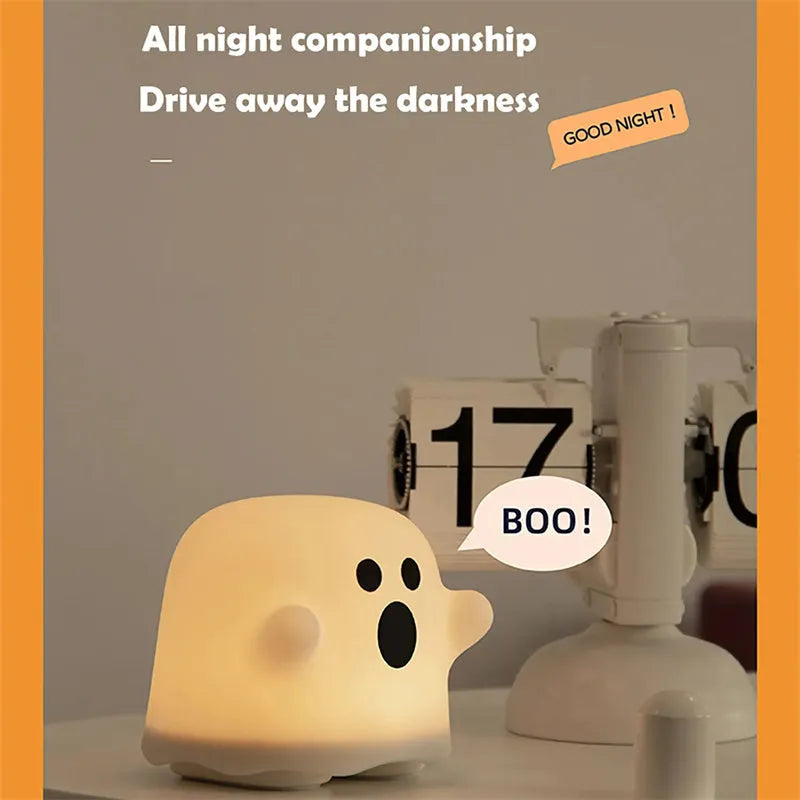 White silicone bedside night light with touch sensor base on wooden table