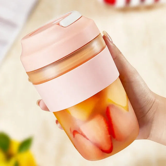 Grape purple portable rechargeable blender juicer cup with 400ml capacity and four stainless steel blades.