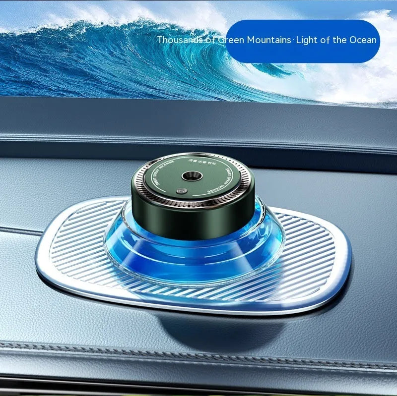 Smart spray car air freshener unit in Gentleman's Black or Qian Shan Cui colours with Ocean and Gulong fragrance refill bottles