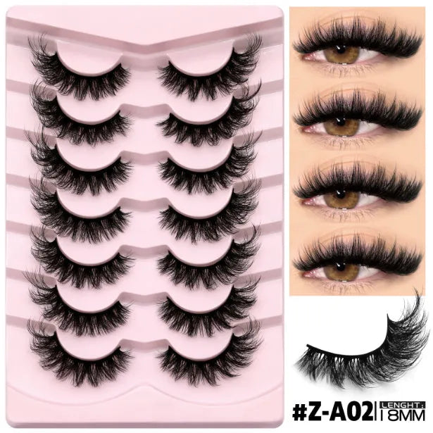 Box of natural style false eyelashes made from artificial fibre, showing thick dense lashes.