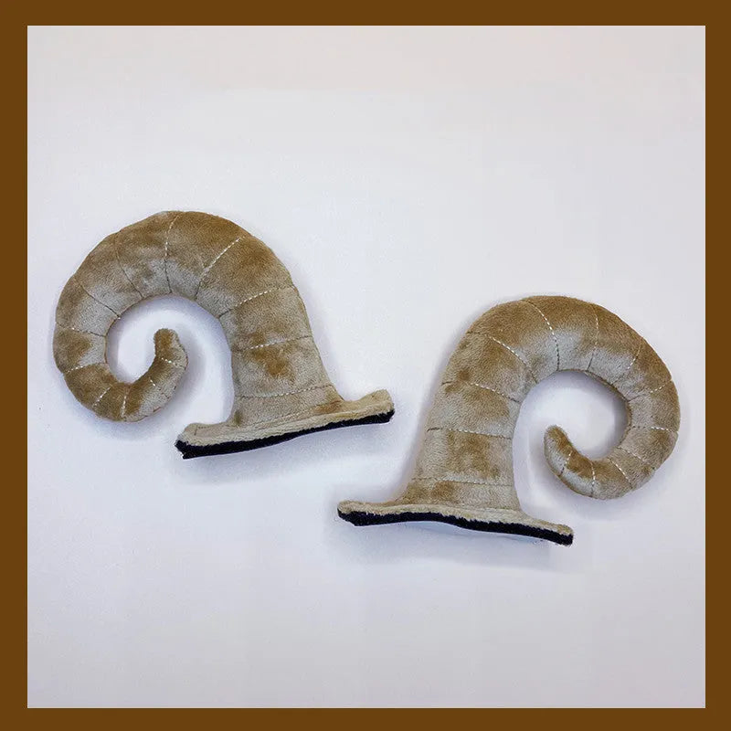 A pair of composite fibre demon horn ornaments for a motorcycle helmet in a chosen colour.
