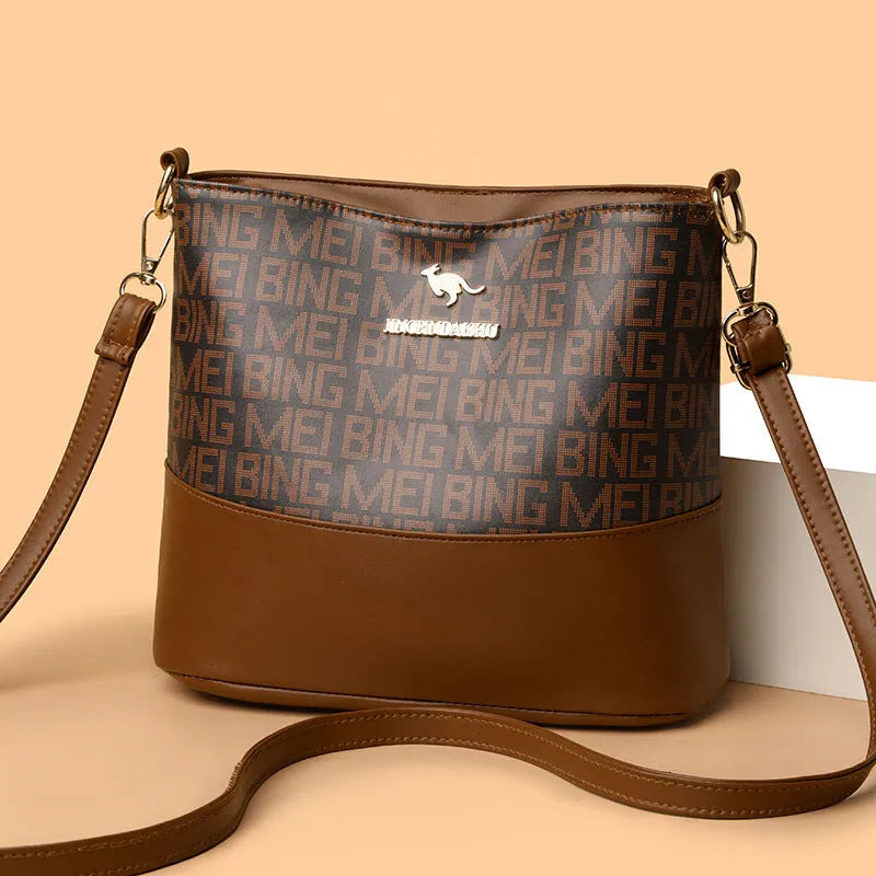 Brown soft PU leather messenger bag with organisation compartments and urban simplicity design