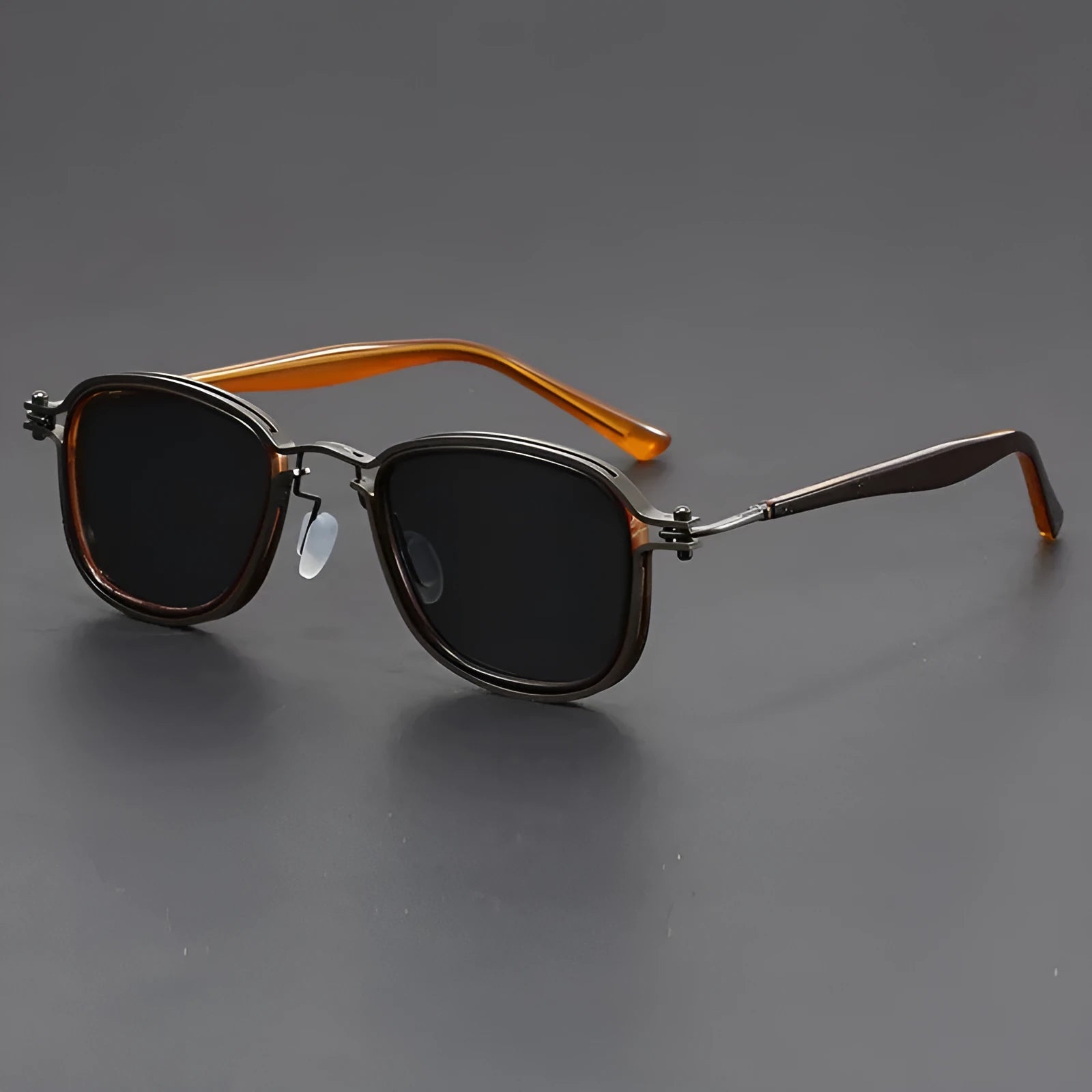 Retro-style square frame sunglasses with metal and plastic construction in a two-tone colour option.