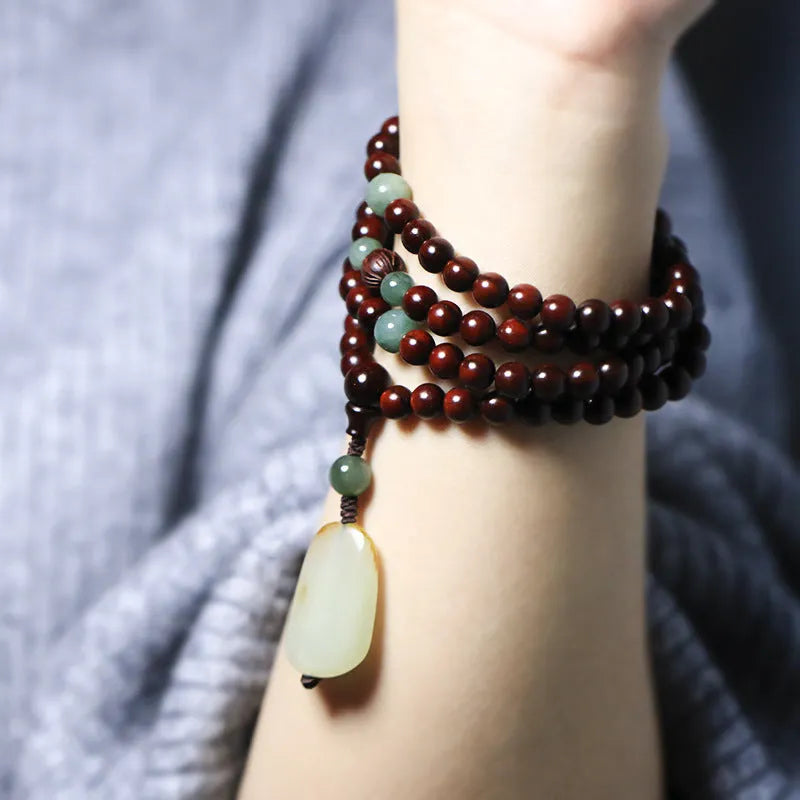 Rosewood beaded bracelet with 108 6mm beads and carved Hotian jade pendant centrepiece