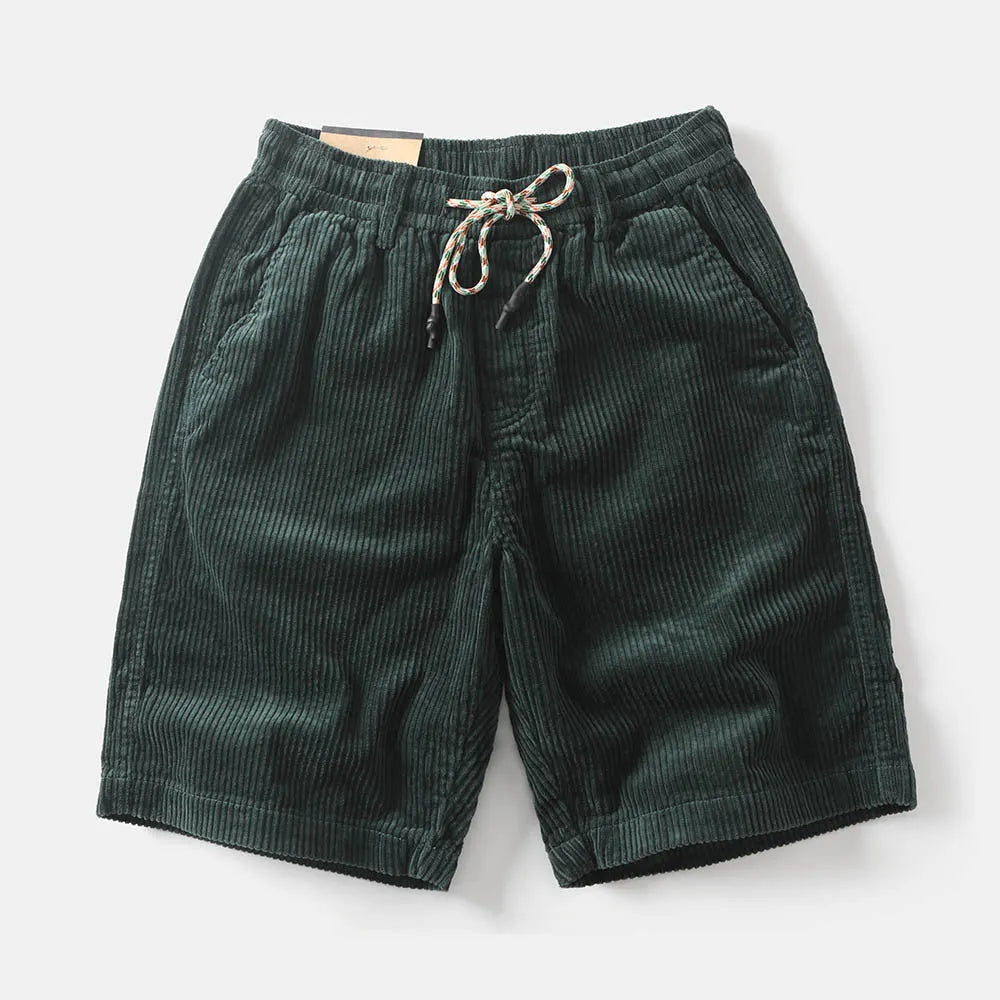 Men's khaki cargo shorts with straight leg fit and fifth pants length, showing multiple cargo pockets