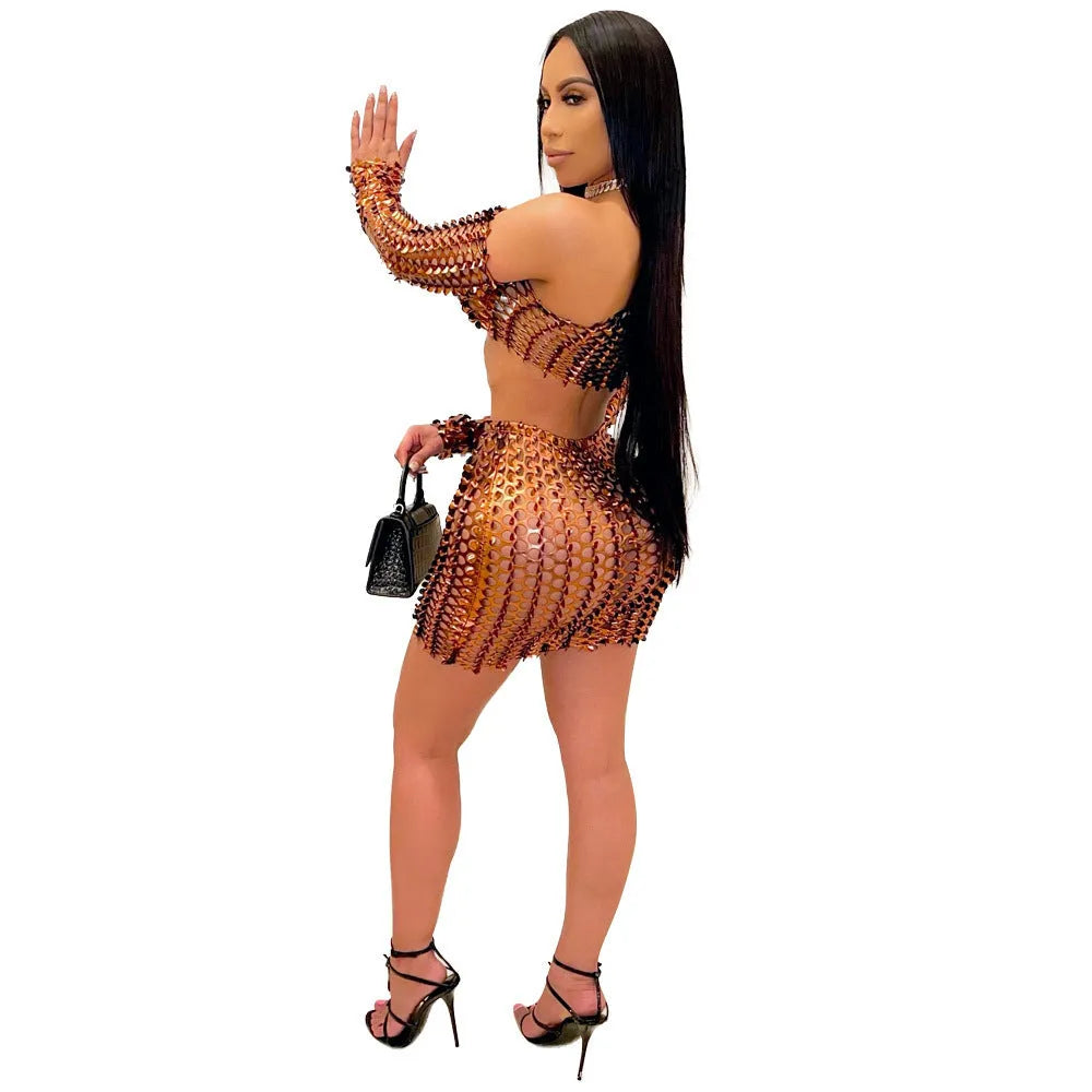 Women's black hollow-out net sleeveless top and short skirt two-piece dress set on a hanger.