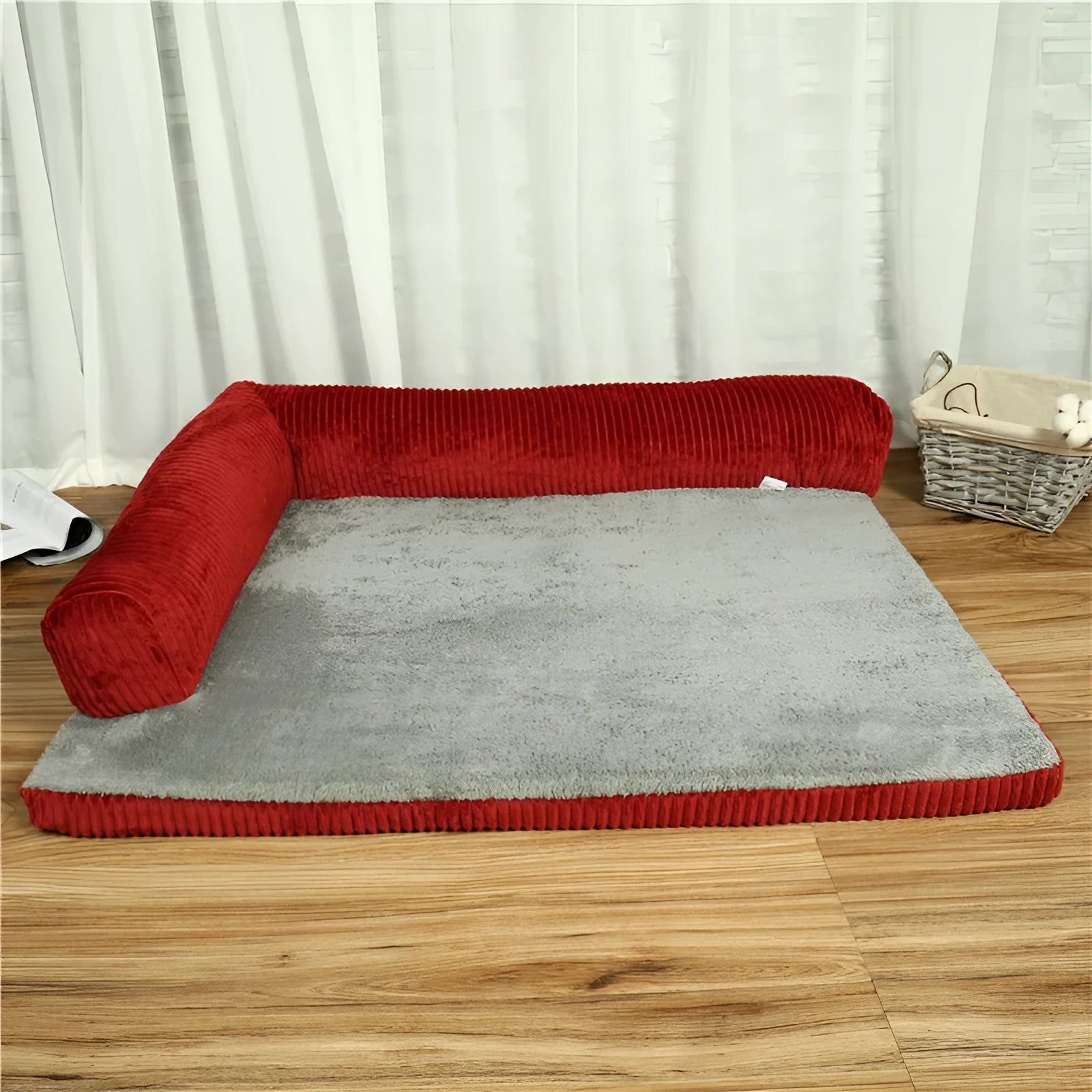 Corduroy dog bed with bolster sides in coffee colour on hardwood floor