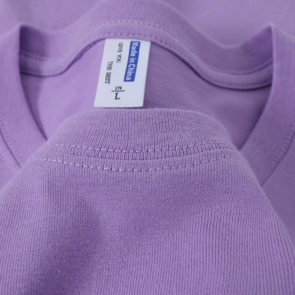 Loose fit cotton t-shirt in multiple solid colours including navy blue, red and white