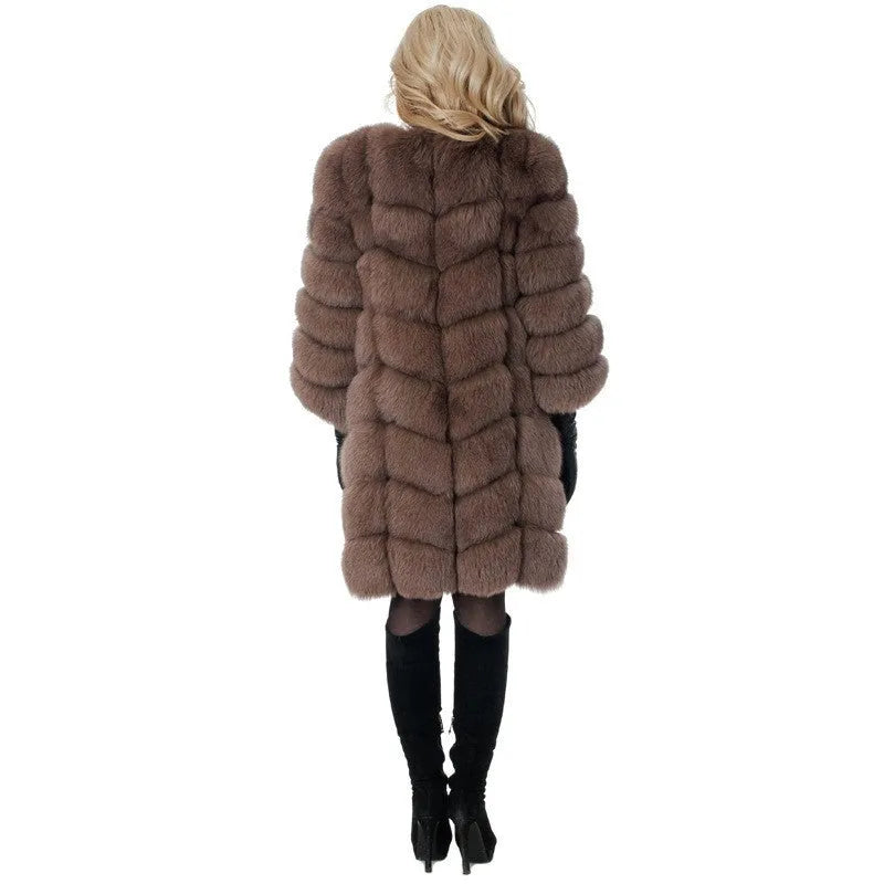 Women's long artificial fur coat in a choice of colours including apricot and black, showing regular sleeves.