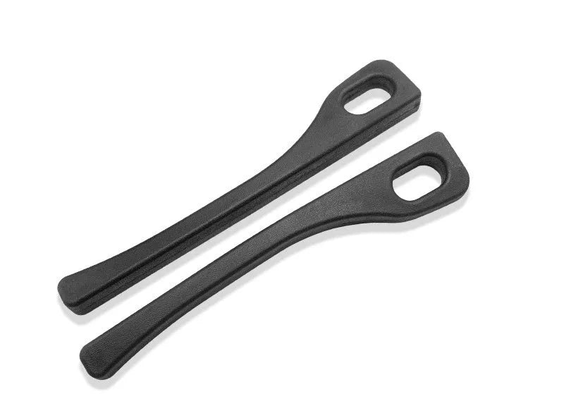 Two polyresin car seat gap sealing strips in chosen colour, showing integrated handle.