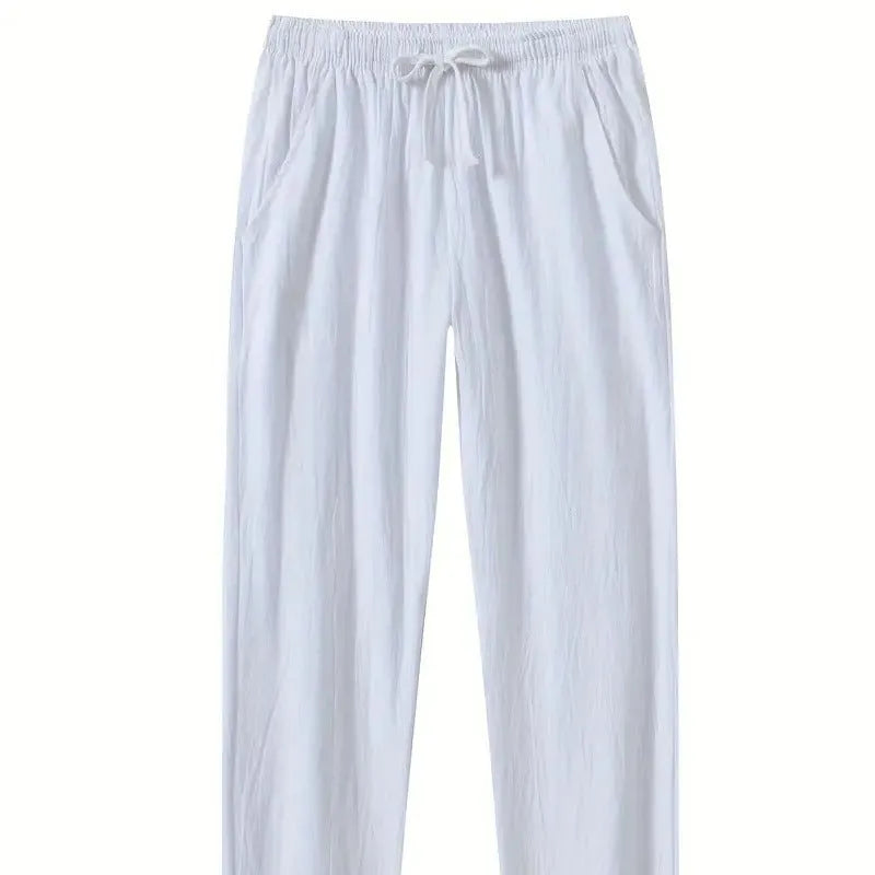 Men's loose-fit cotton beach trousers in solid white, sky blue, khaki, or black colours.
