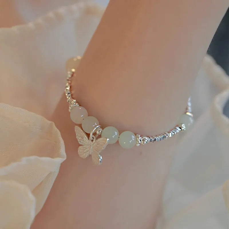 Silver butterfly necklace and bracelet set for women with electroplated copper construction