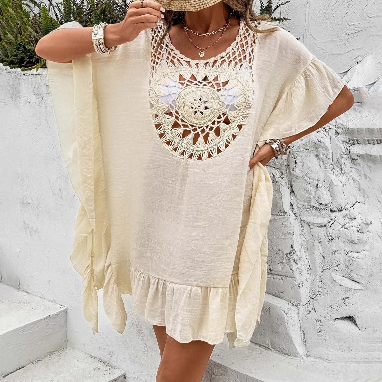 Crochet stitching tassel beach cover-up dress in a patchwork skirt style.