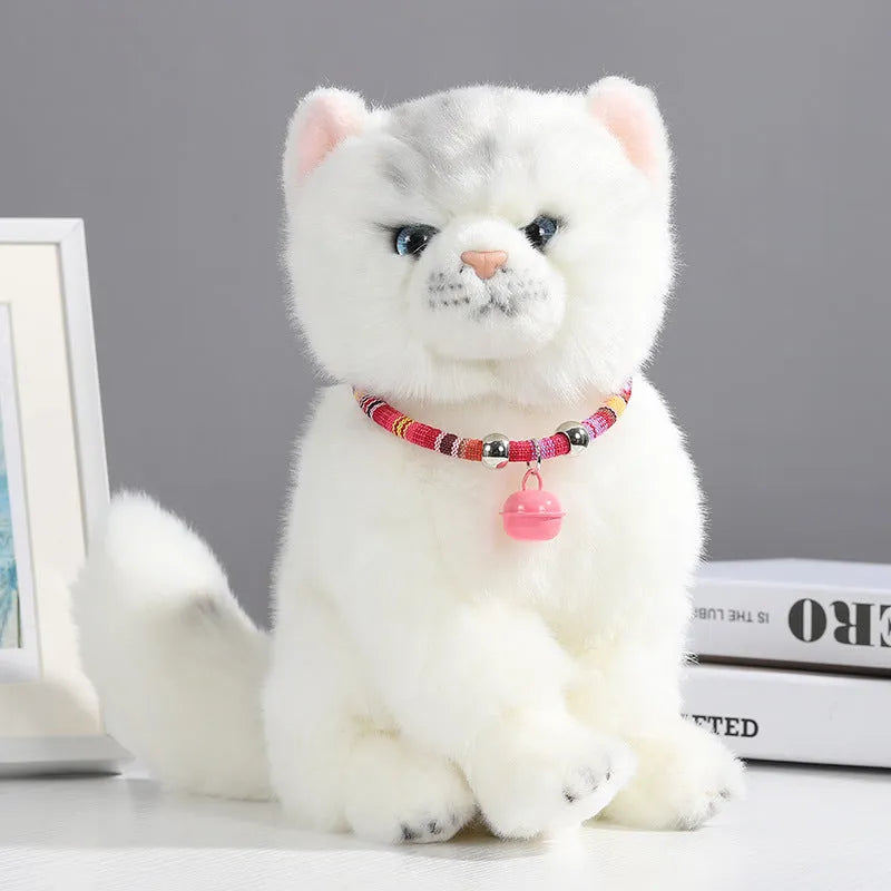 An adjustable ethnic-style pet collar with a metal buckle and bell, shown in various colours.