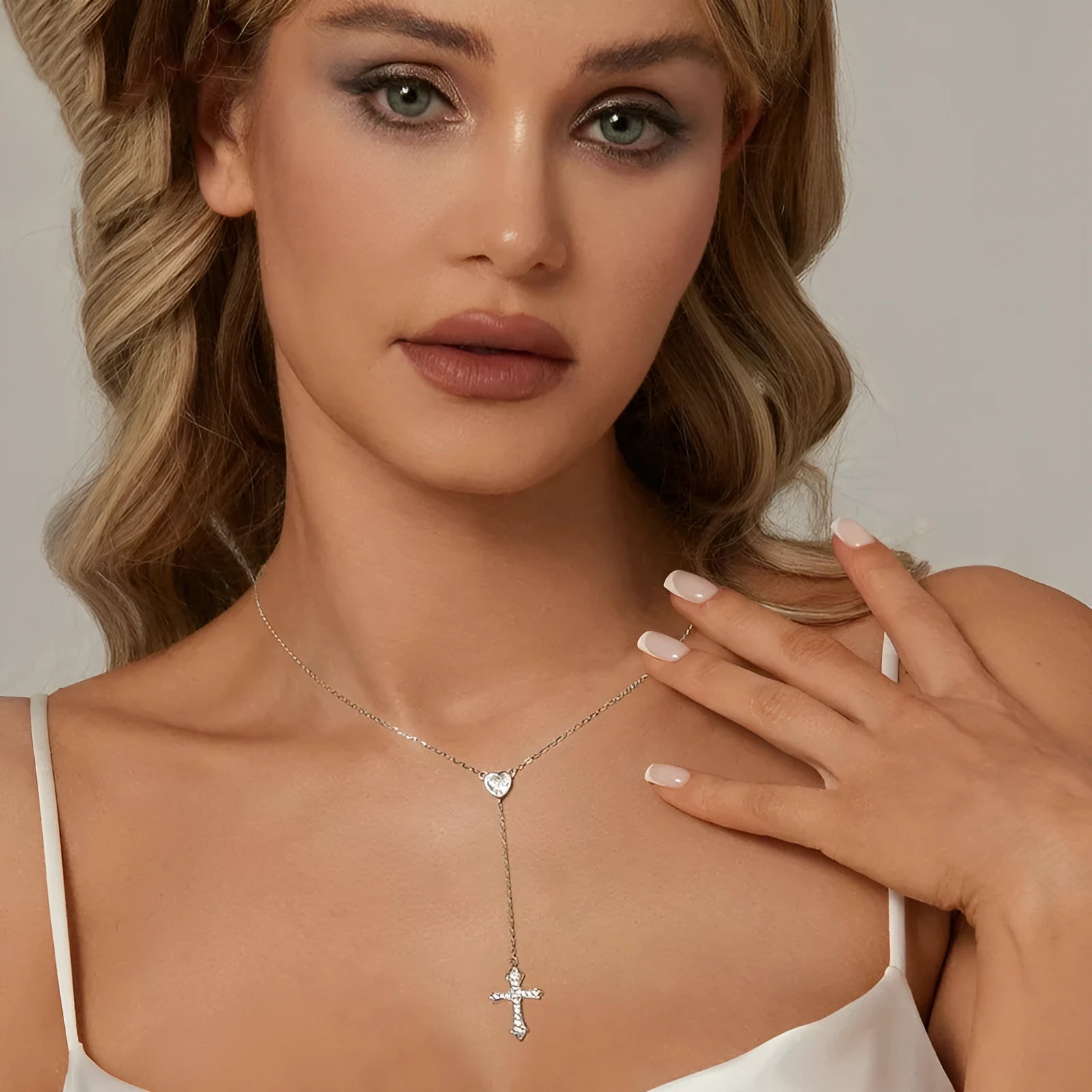 Silver love cross necklace for women with V-neck design and O-ring chain in colour BSN384