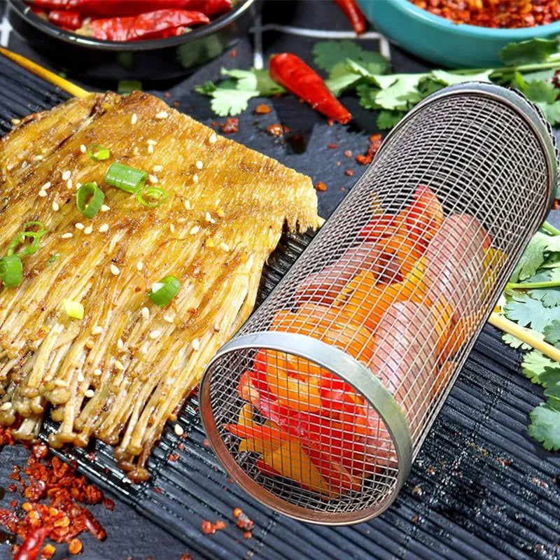 Rolling grill basket iron wire mesh 20x10x10cm with hook, filled with vegetables on a barbecue