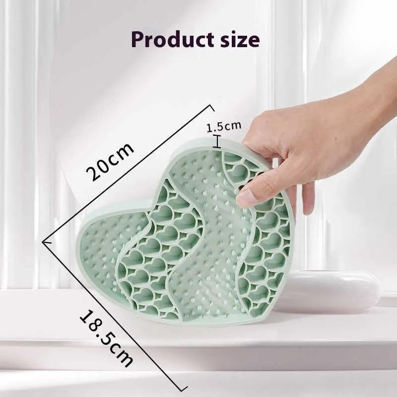 Bright bamboo green silicone dog licking mat on a light floor, textured surface with ridges, 20x18.5cm