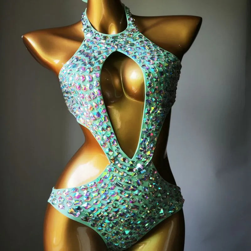 Women's black mesh diamond one-piece swimsuit on a mannequin, showing the front design.