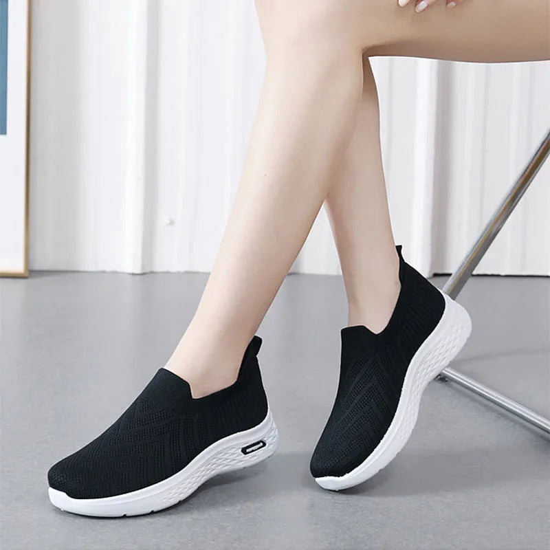 Women's casual mesh slip-on shoes, breathable sock style, soft plastic sole, available in black grey khaki pink