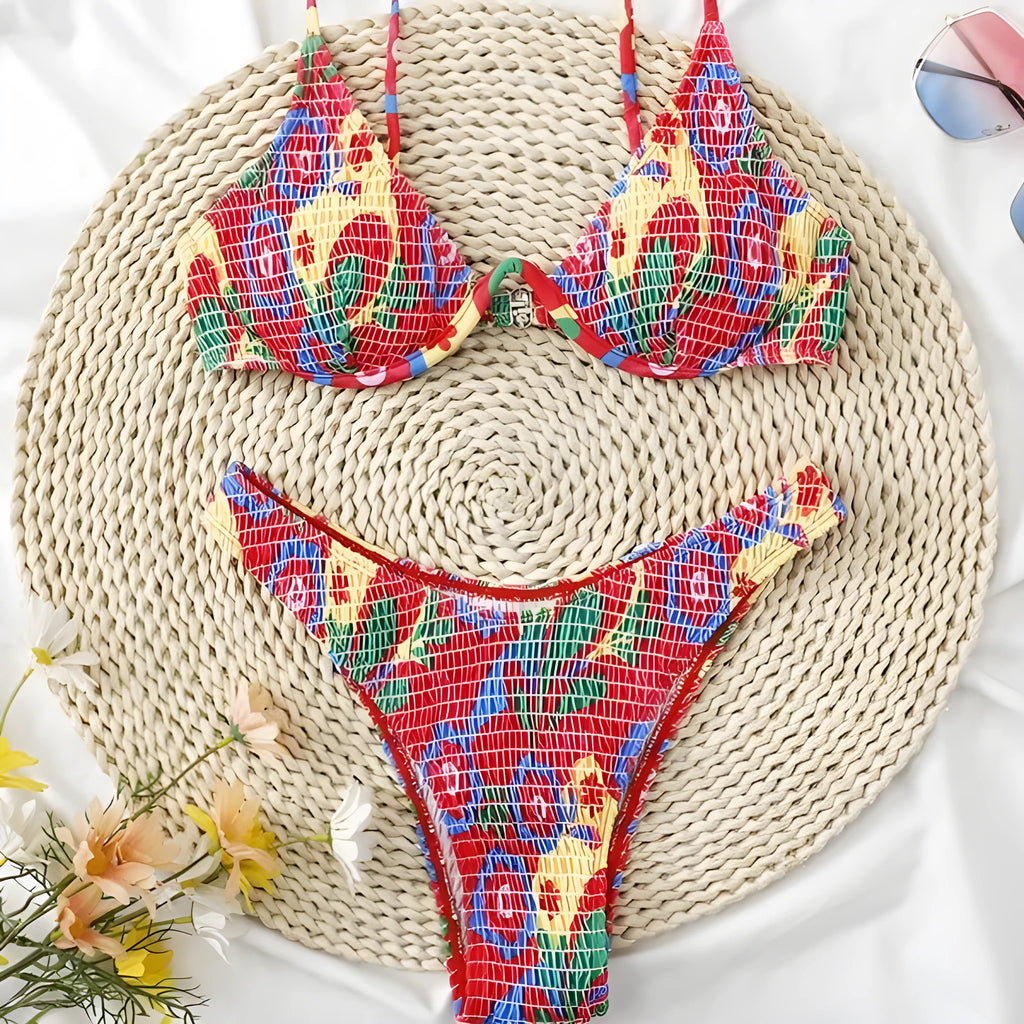 Red floral print women's two-piece underwire bikini set on a mannequin.