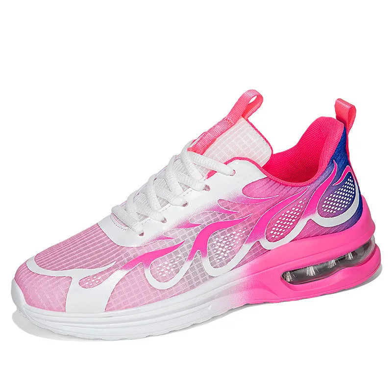 Women's pink mesh and PU sole casual sneaker shown from the side.