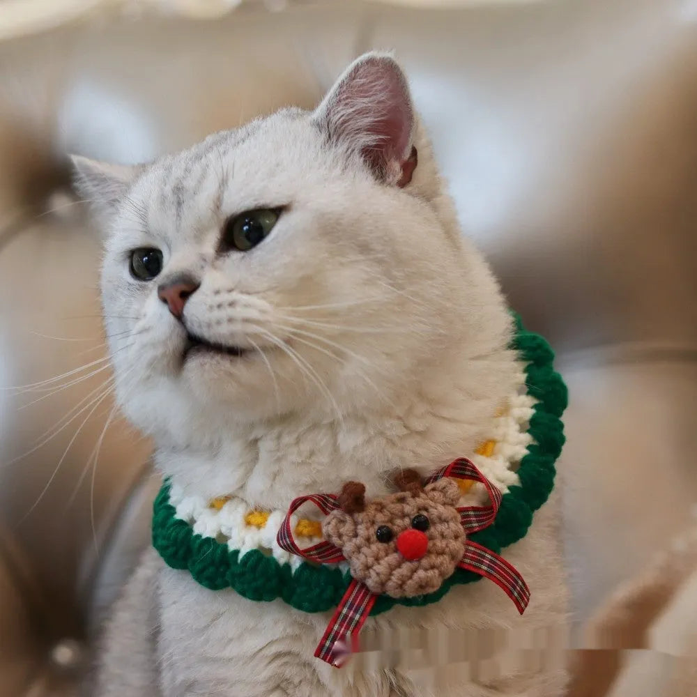 Knitted wool Christmas scarf for pets featuring festive patterns like striped Santa and elk, shown attached to a dog collar.
