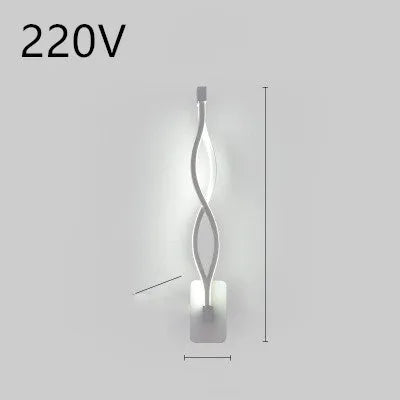 Minimalist Nordic design LED wall lamp with a silicone shade, mounted on a bedroom wall.