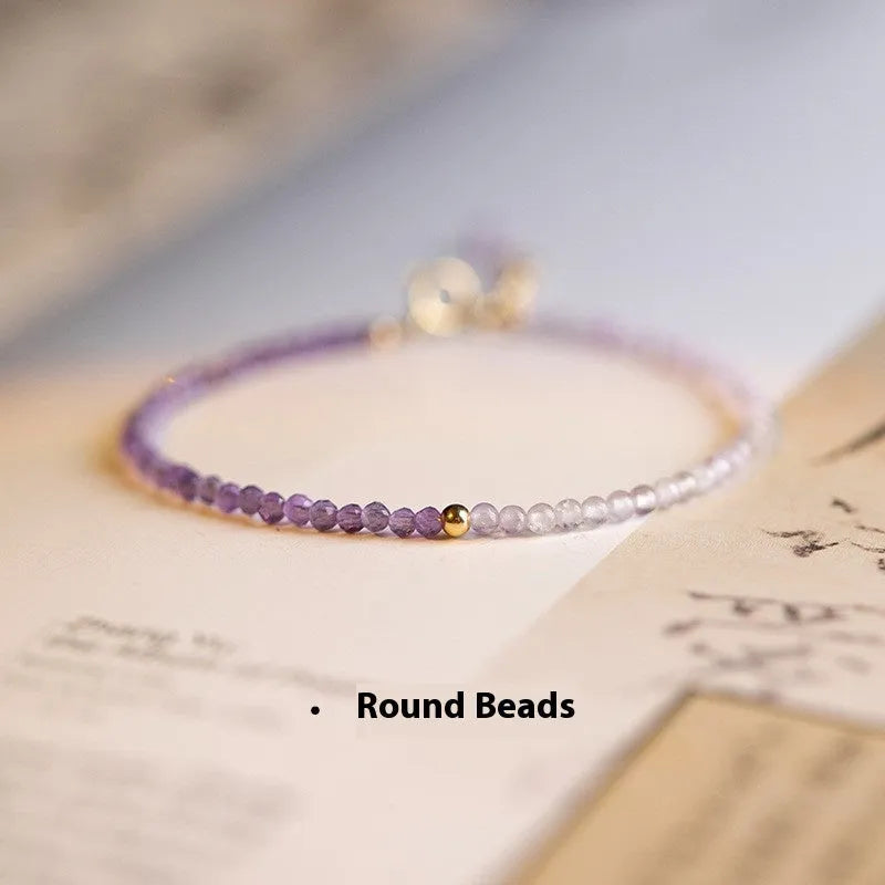 Close-up of a purple geometric rattan crystal bracelet with 2mm thickness and cut facets.