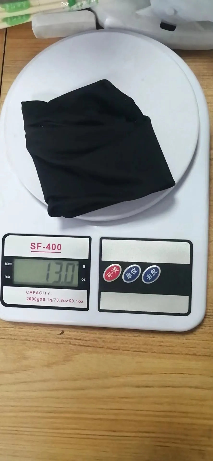 Compact black wrist armband bag for mobile phone, shown with dimensions 10cm by 10.5cm.