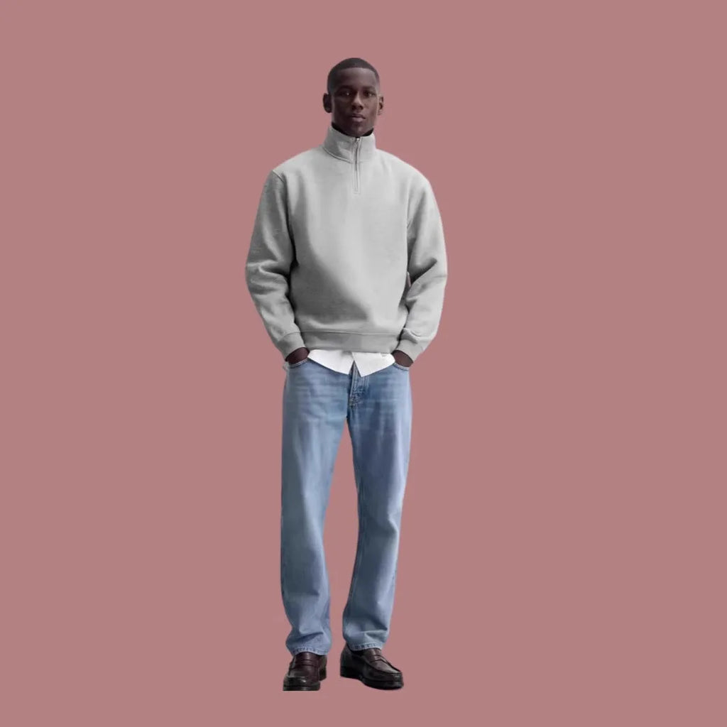 Grey unisex half-zip stand collar cotton sweater on a hanger.