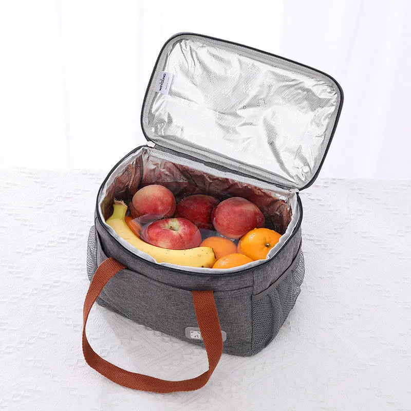 Insulated crossbody picnic bag in Oxford cloth with shoulder strap, shown in grey colour