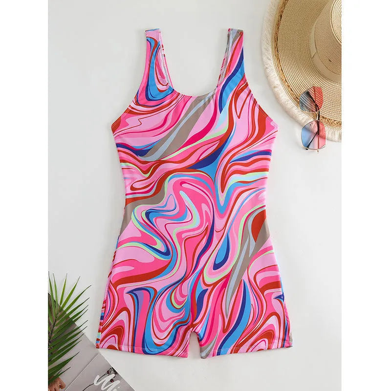 Women's printed polyester one-piece swimsuit with a high-waist and backless design.