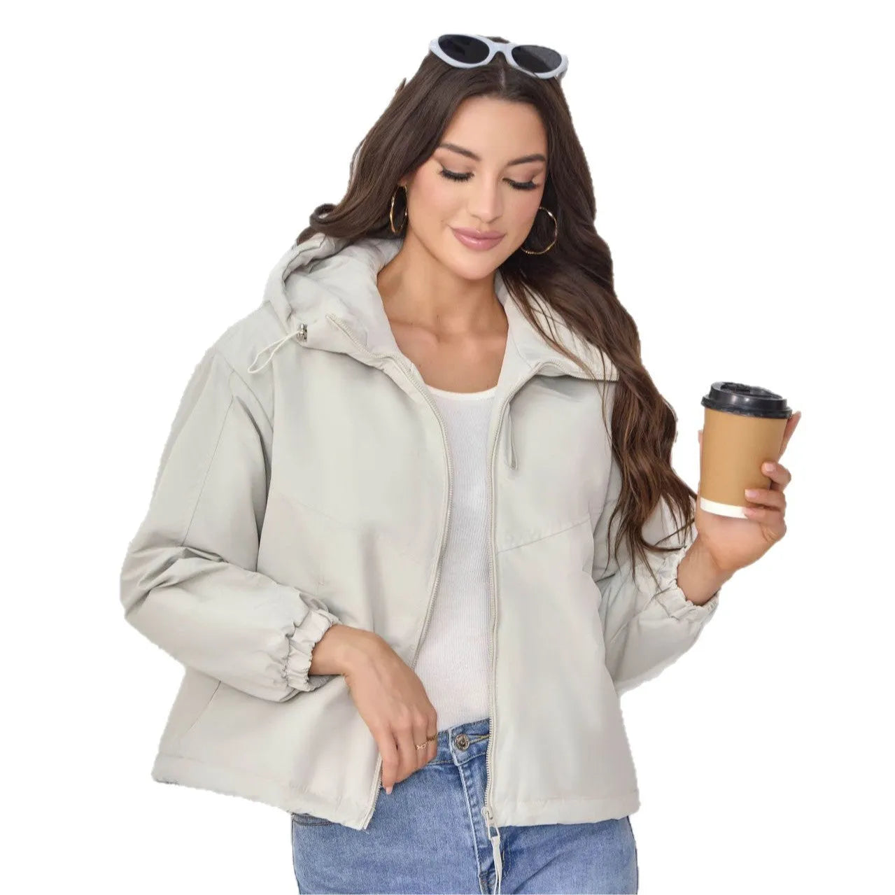 Women's grey loose-fit hooded polyester shell jacket with long sleeves.