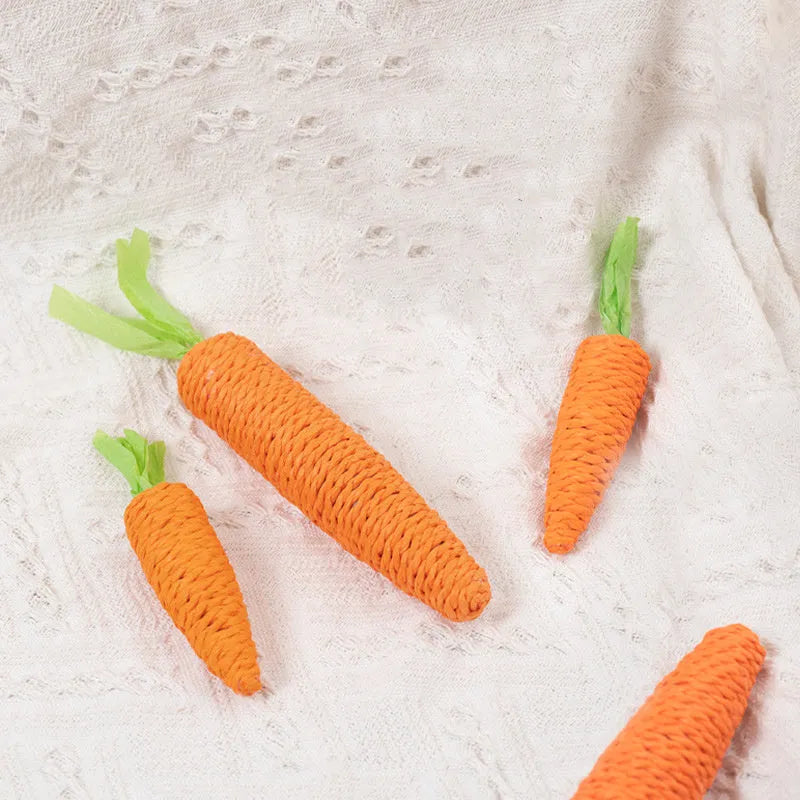 Cat toys multipack with carrot-shaped paper crinkle toys, ringing stones, interactive sticks, and dental grinding sticks